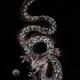 Eastern fire dragon dancing with the pearl sumi-e artwork on black... (thumbnail)