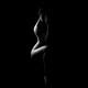 Vertical abstract nude woman body outline on black background black an... (thumbnail)
