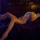 Sensual woman caressing herself lying half-naked with her body arching... (thumbnail)