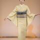 Japanese woman in a beige kimono at a fashion show... (thumbnail)