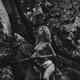 Fine art black and white photo of a naked young woman riding a horse... (thumbnail)