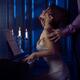 Sensual couple romantic portrait man caressing neck of a woman playing... (thumbnail)