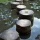 Stepping stones across a pond in a Zen garden Japan... (thumbnail)