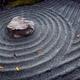 Japanese Zen rock garden fragment with circular waves radiating from a... (thumbnail)