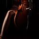 Sensual closeup of a woman hand with a bow passionately playing cello... (thumbnail)