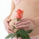 Pregnant Woman Holding a Red Rose... (thumbnail)