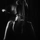 Woman passionately playing cello Dramatic dark contrast black and whit... (thumbnail)