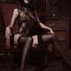 Boudoir portrait of a sexy woman with short hair in black lingerie and... (thumbnail)
