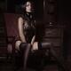 Boudoir portrait of a sexy woman with short hair in black lingerie and... (thumbnail)