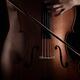 Fine art nude mysterious concept woman playing cello closeup of hands... (thumbnail)