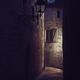 Dark old street with stone houses in a medieval French town at night... (thumbnail)