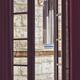 Open window with a view on a stone wall of a house in France... (thumbnail)