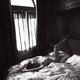 Artistic erotic black and white portrait of a nude sexy woman lying re... (thumbnail)