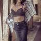 Sexy glamorous woman walking on a street in France removing her shirt... (thumbnail)