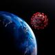 Coronavirus COVID-19 virus particle casting shadow over planet Earth e... (thumbnail)
