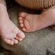 Closeup of newborn baby bare feet... (thumbnail)