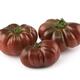 Three dark red organic heirloom tomatoes Black Krim or Crimean Black i... (thumbnail)