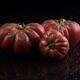 Dark red organic heirloom tomatoes Black Krim or Crimean Black with wa... (thumbnail)