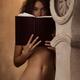 Woman standing naked with a book leaning against an antique clock in o... (thumbnail)