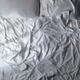 Unmade empty bed White bedsheets View from above... (thumbnail)
