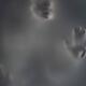 Ghostly gray woman face behind a hazy blurry suffocating fog Suffering... (thumbnail)