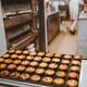 Pasteis de Nata traditional Portuguese custard tarts on a tray in a ca... (thumbnail)