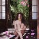 Sensual portrait of beautiful young nude woman with long hair sitting... (thumbnail)
