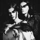 Two ladies together. Woman standing behind another embracing her. Vint... (thumbnail)