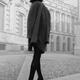 Elegant incognito woman on a city street wearing a fashionable coat, b... (thumbnail)