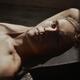 Portrait of a sexy handsome man face with short blond hair, bare torso... (thumbnail)