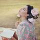 Romantic sensual portrait of a beautiful woman with pink flowers in he... (thumbnail)