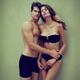 Fashion portrait of a sexy young couple in black underwear... (thumbnail)