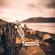 Skeleton sitting on a bench by the sea enjoying sunset in Carlingford... (thumbnail)