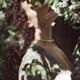 Beautiful woman profile of her face with closed eyes in cherry tree bl... (thumbnail)