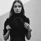 Black and white portrait of a young woman with an expressive look and... (thumbnail)