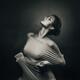 Woman in tight stretchy dress over naked body Black and white art nude... (thumbnail)