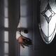 Man hand reaching for a door handle from behind a dark shadowy house e... (thumbnail)
