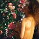 Young woman with sexy sun tanned body standing naked covering her brea... (thumbnail)