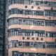 Wall of an urban residential high-rise building with balconies in Hong... (thumbnail)
