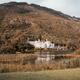 Kylemore Abbey in Connemara, Ireland in mountain landscape scenery... (thumbnail)