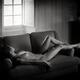Beautiful nude woman with sexy shiny skin and sensual slim body reclin... (thumbnail)