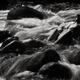 Beautiful nude couple making love in wild water of a mountain river in... (thumbnail)