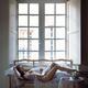 Sensual boudoir portrait of a beautiful half naked woman in sheer whit... (thumbnail)