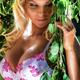 Glamour portrait of a beautiful sexy blond woman in lingerie with gree... (thumbnail)
