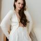 Sensual portrait of a sexy woman with long brown hair in unbuttoned wh... (thumbnail)