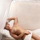 Beautiful nude young woman sleeping on sofa in relaxed sensual pose wi... (thumbnail)