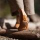 Woman walking in the nature wearing deer hide deerskin moccasins on he... (thumbnail)