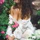 Sensual portrait of a beautiful woman in wet summer dress sitting in r... (thumbnail)