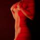 Beautiful slim nude woman body with red laser stripes on bare skin... (thumbnail)