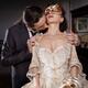 Romantic couple, man caressing and kissing beautiful lady in carnival... (thumbnail)